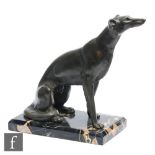 Unknown - A French Art Deco bronzed spelter figure, of a stylised seated greyhound, mounted to a