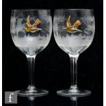 Moser - A pair of clear crystal wine glasses, the optic ribbed ovoid bowl engraved with a tree