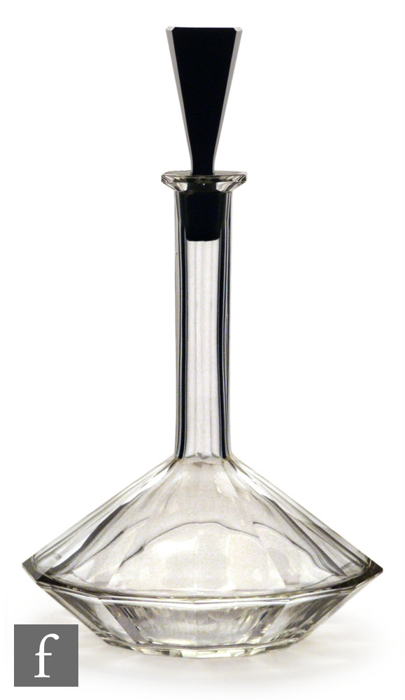 Unknown - A 1930s glass ship?s decanter, probably Czechoslovakian, cut with flutes, with black