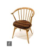 Lucian Ercolani - Ercol Furniture - A beech and elm model 449a Windsor bow top armchair or 'Cowhorn'