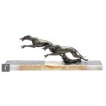 Unknown - An Art Deco bronzed spelter study, circa 1930s, of racing greyhounds jumping over a tree