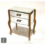 Unknown - A French Art Deco mirrored bedside cabinet, the two drawers with tubular lucited brass