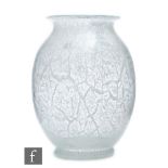 Loetz - An Art Deco glass vase circa 1930, of footed ovoid form with everted rim, in the