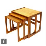 Victor B. Wilkins - G-Plan - A nest of three teak occasional tables on strut loop supports, the