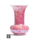 Ruskin Pottery - A small vase of globe and shaft form decorated in an all over Strawberry Crush