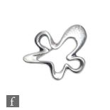 Henning Koppel for Georg Jensen - A Danish silver 'Splash' brooch model number 321, width 5cm.