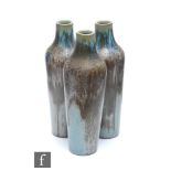Denbac - An early 20th Century French vessel formed as three conjoined vases, each decorated in a