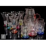 Bob Crooks - A contemporary glass drinking suite in the Rainbow Ripple pattern, decorated in clear