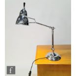 Unknown - A chrome adjustable desk lamp, the stepped circular base with tubular adjustable arms