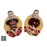 Sarreguemines - A pair of late 19th Century majolica wall pockets modelled as Pierrot, one marked