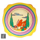 Clarice Cliff - Seven Colour Trees & House - A large Leda shaped plate circa 1930, hand painted with