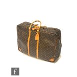 Louis Vuitton - A large 'Sirus' monogram leather soft case suitcase with Vachatta leather