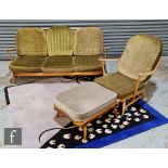 Lucian Ercolani - Ercol Furniture - A beech framed model 203 Windsor bergere three-seat settee or