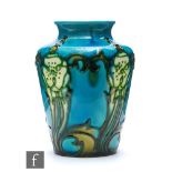 Minton Seccessionist - A small early 20th Century vase decorated with tubed flowers and foliage