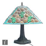 Attributed to Richard Hoosin, American - A leaded green glass and seashell inset table lamp shade,