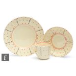 Clarice Cliff - Wave Line - A Windsor shape coffee cup, saucer and side plate circa 1936, hand