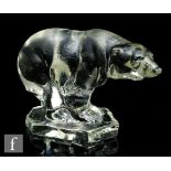 Unknown - A French Art Deco moulded glass figure of a standing polar bear on a block base, unsigned,