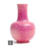 Ruskin Pottery - A vase of globe and shaft form decorated in an all over Strawberry Crush glaze with