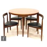 Hans Olsen - Frem Rojle, Danish - A teak circular nesting dining table and four chairs raised to