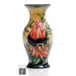 A Moorcroft Pottery vase decorated in the Sturt's Desert Pea pattern from the Australian