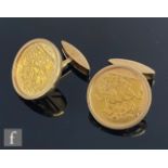 A pair of 9ct mounted full George V full sovereign swivel cufflinks, sovereigns dated 1913, total