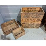 Four early 20th Century pine crates each with pictorial stencilled advertising for Coopers Dipping
