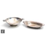 A Danish silver small pedestal bowl of plain form with twin fruiting vine handles, diameter 18cm,