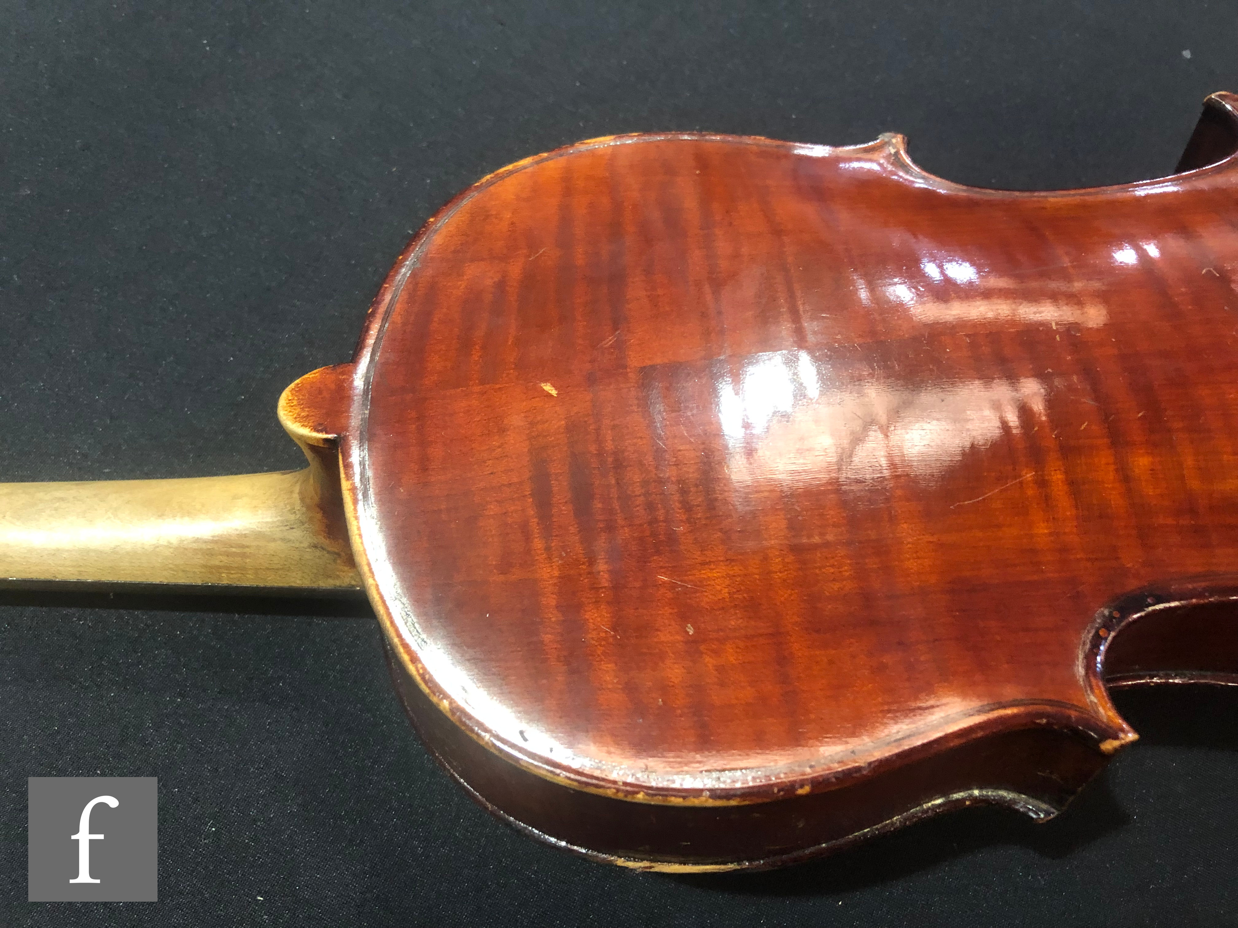 A late 19th Century German violin, length 36cm, and a bow, in later black zip case. - Image 12 of 16