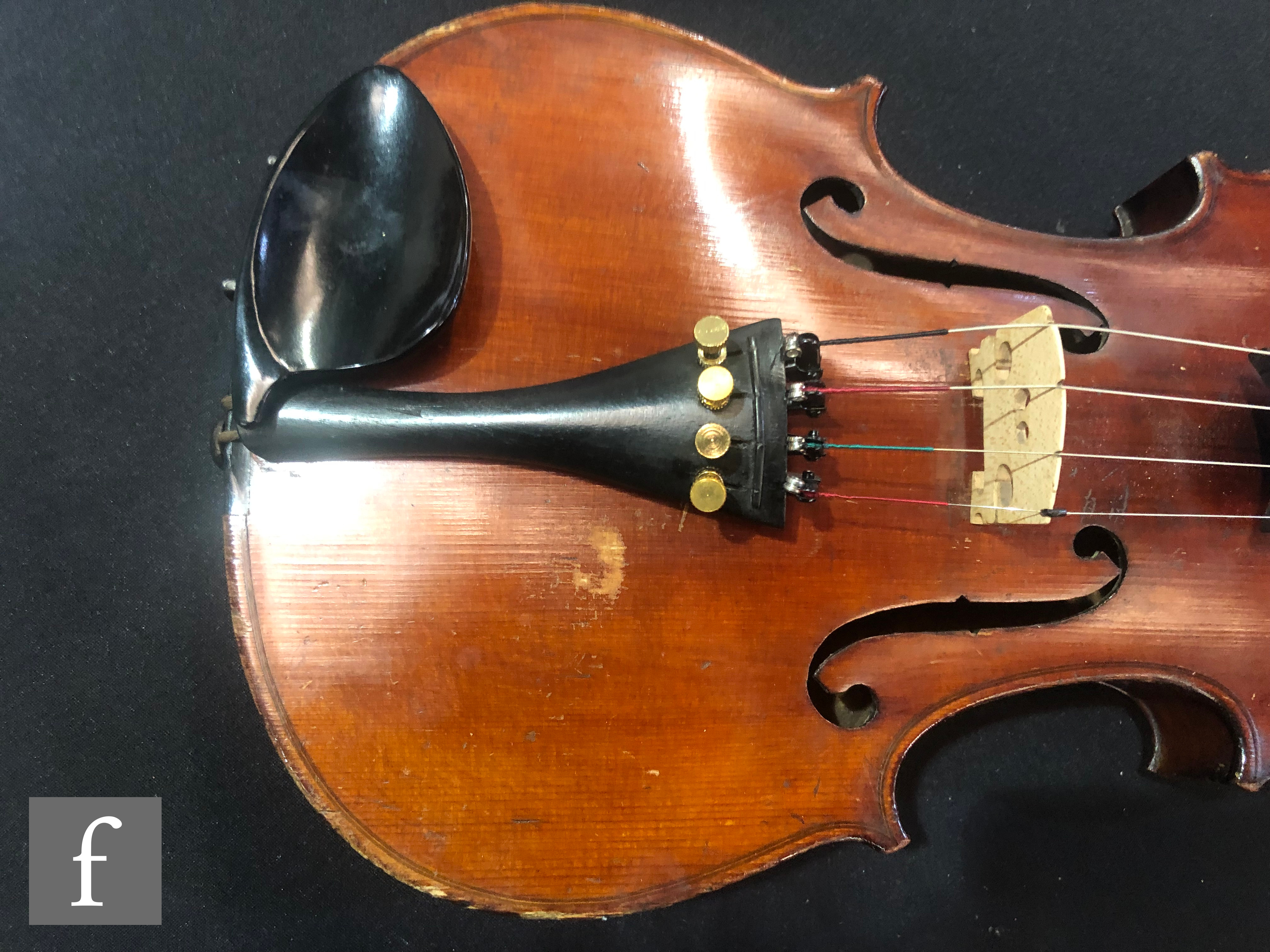 A late 19th Century German violin, length 36cm, and a bow, in later black zip case. - Image 6 of 16