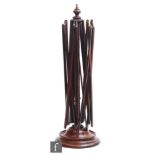 A late 19th Century mahogany wool winder on circular turned base, height 54cm.