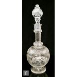 An early 20th Century Thomas Webb & Sons clear crystal decanter of footed globe and shaft form,