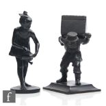 A 19th Century cast iron figure of a man wearing a hat and carrying a large box, height 15cm,