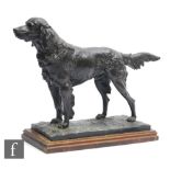 A 20th Century patinated spelter figure of a Pointer in a poised standing pose, mounted on a stepped