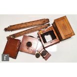 A late 19th Century mahogany cased half plate camera ?The Sanderson?, a similar unnamed half plate