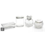 Four hallmarked silver topped scent and dressing table bottles to a rouge pot, trinket box and other