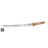 A Japanese wakizashi sword, the 14.5 inch blade extending to an earlier Meiji period (1868-1912)