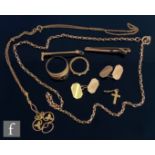 A small parcel lot of assorted 9ct jewellery to include an Edwardian peridot pendant, cufflinks, bar