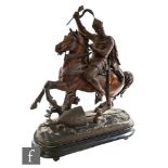 An early 20th Century spelter figure of Edward III on horseback, raised to a black painted base,