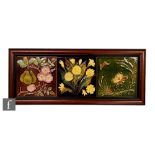 Three late 19th Century 6 inch majolica tiles, each with relief moulded floral decoration, framed