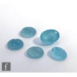 Four cut and polished loose, unused aquamarine stones, oval engraved cabochon cut, each