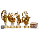 A set of four continental blanc de chine figurines modelled as dancing ladies each in a different