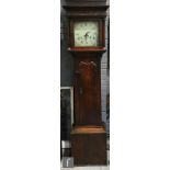 An early 19th Century 30 hour oak longcase clock, the pillared hood enclosing an 11 inch square