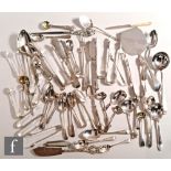 A parcel lot of assorted hallmarked silver flatware to include condiment spoons, ladles, sugar