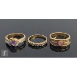 Three 9ct hallmarked stone set rings, two single stone amethyst and a diamond set example with heart