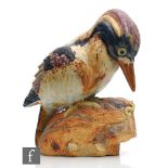 A post war Swedish stoneware model of a kingfisher by Tyra Lundgren, with coloured glaze and oxide