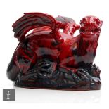 A large Royal Doulton Flambe Veined model of a dragon, printed mark, height 19cm, length 28cm.