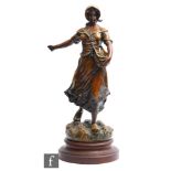 A late 19th Century cold painted spelter figure, after Geo Maxim, titled Semeuse, modelled as a