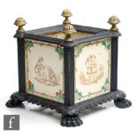 A 19th Century cast iron planter with four Minton Hollins 6 inch allegorical tiles each decorated