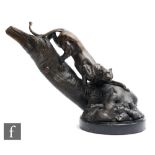 A later 20th Century French patinated bronze study depicting a prowling panther descending a tree