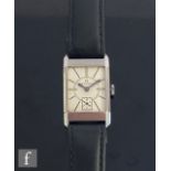 A mid 20th Century stainless steel Omega manual wrist watch, batons to a rectangular cream dial,